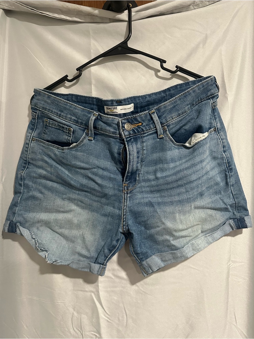 Levi's Light Blue Distressed Denim Shorts